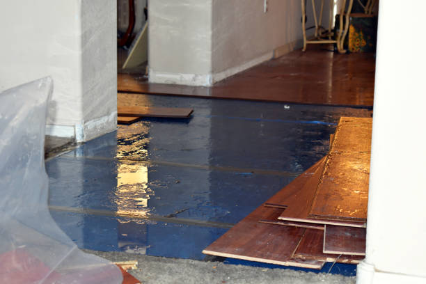 Professional Flood Damage Restoration technician working in Glasgow, OR